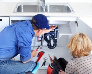plumber-woman-fix-leaky-sink